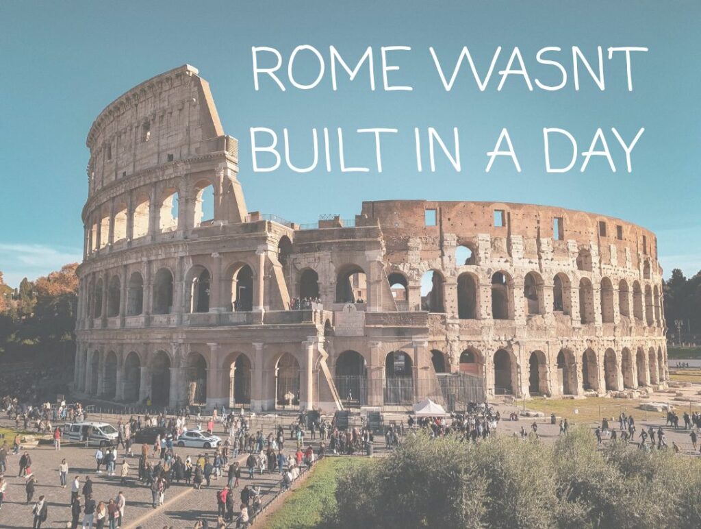 Motivational quote "Rome wasn’t built in a day" encouraging patience, consistency, and long-term growth.